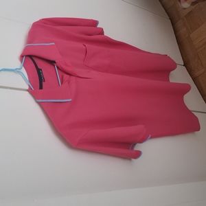 Pink shirt, large size, brand is "unique"